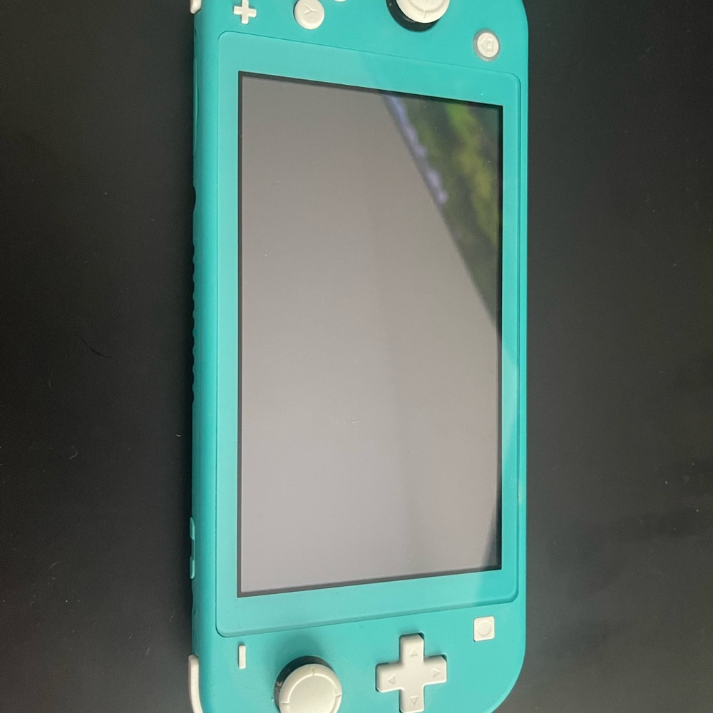 Nintendo Switch Lite with 2 games